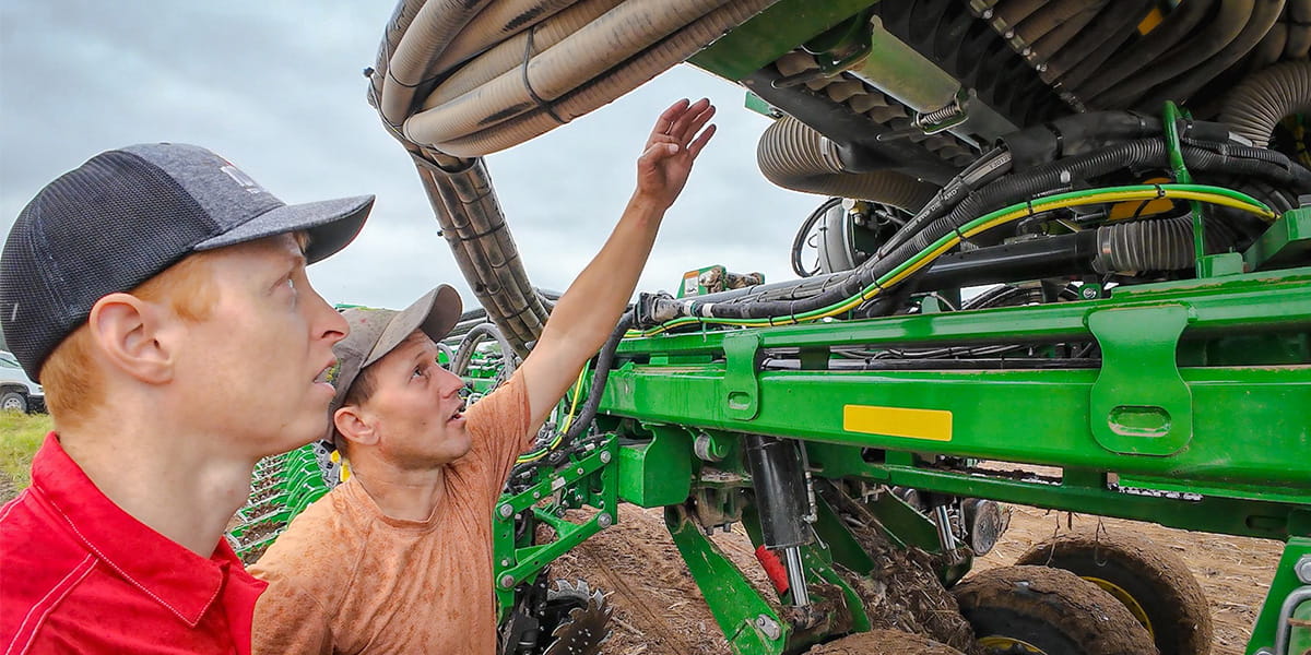 inspecting air seeder hoses