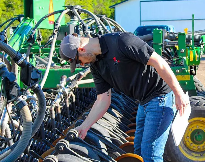 Elijah Inspecting a seed drill